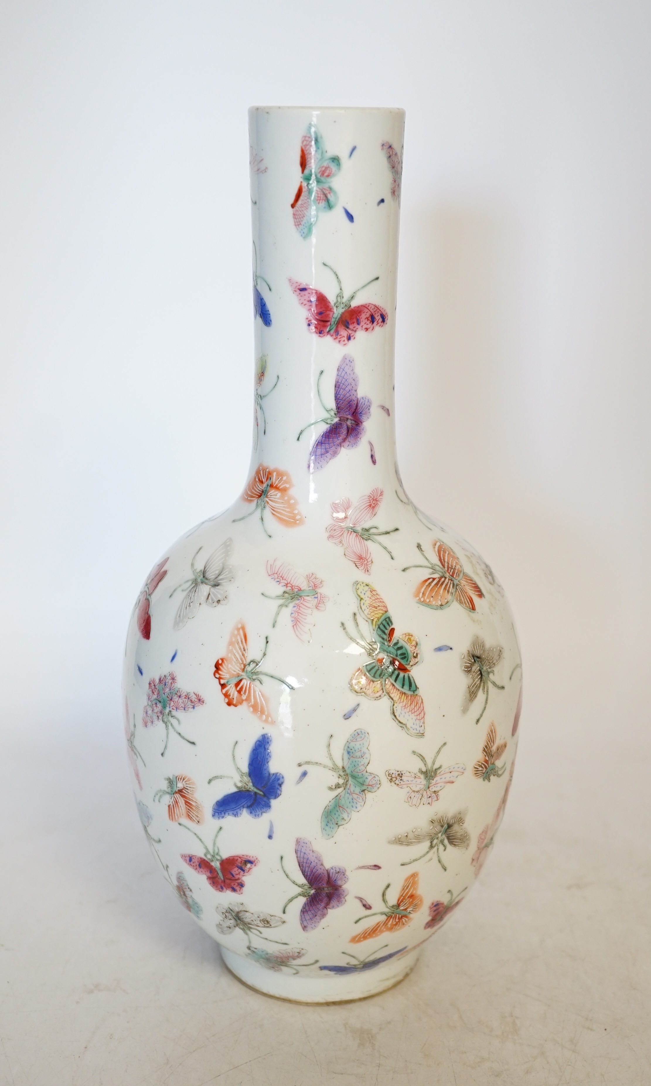 A Chinese famille rose ‘butterflies’ vase, 29cm high. Condition - good